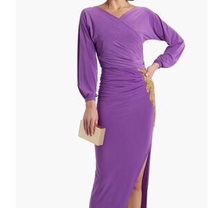 Gorgeous new wrap-effect embellished satin-Jersey gown .